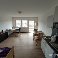 Wohnraum mit integrierter Küche von Heimathof Ruhr Hagen